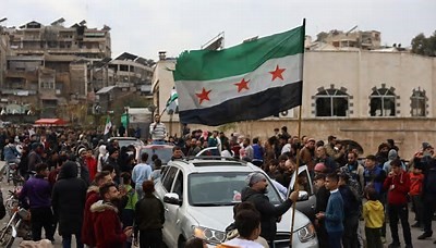 Rebeldes tras varios días de enfrentamiento, toman capital de Siria y derrocan régimen de Bashar alAssad.