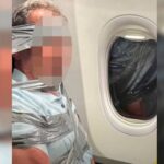 Amarran con cinta a pasajero agresivo en avión
